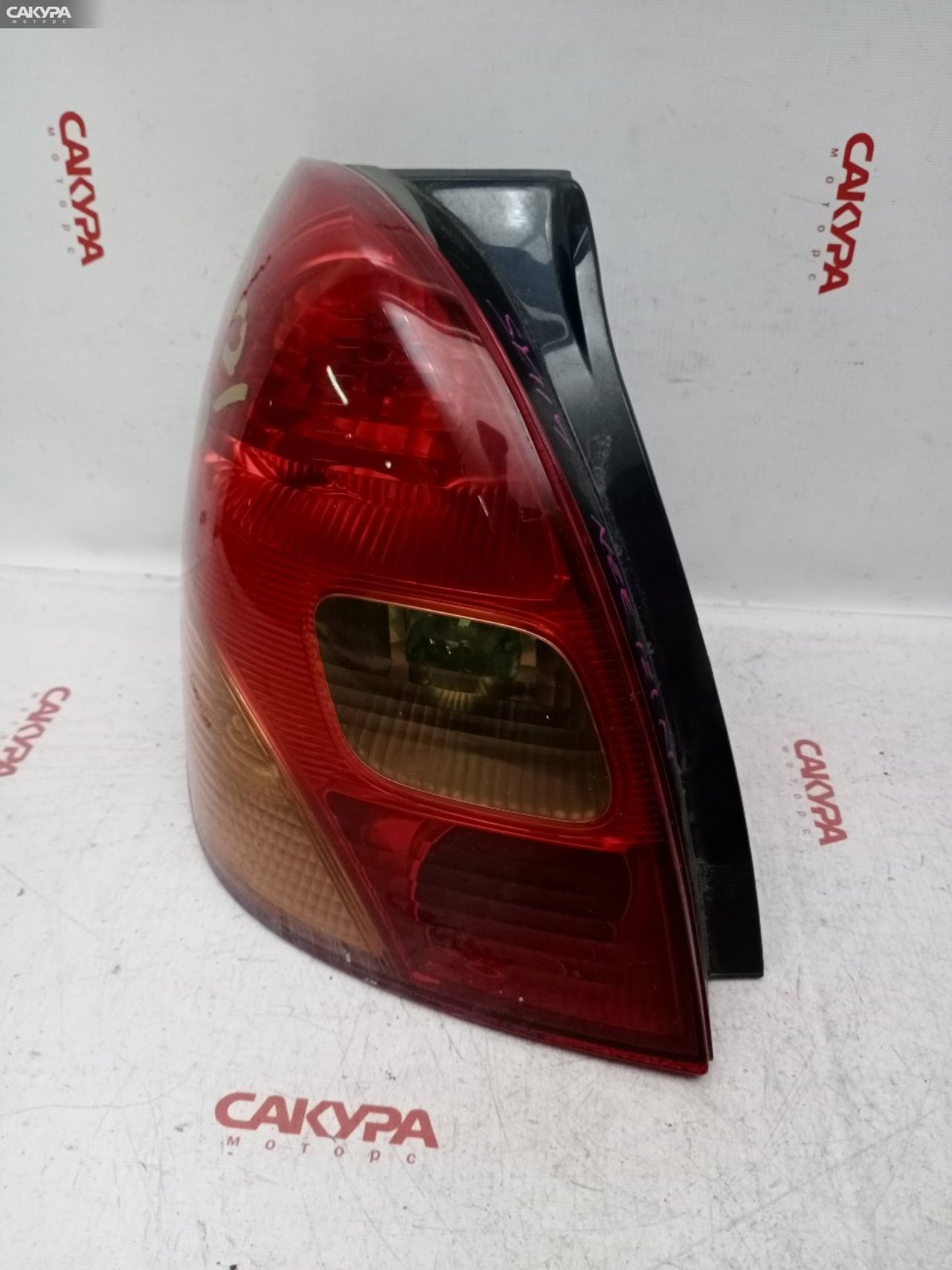 Фонарь стоп-сигнала левый Toyota Corolla Spacio NZE121N 1NZ-FE 13-69: купить в Сакура Красноярск.