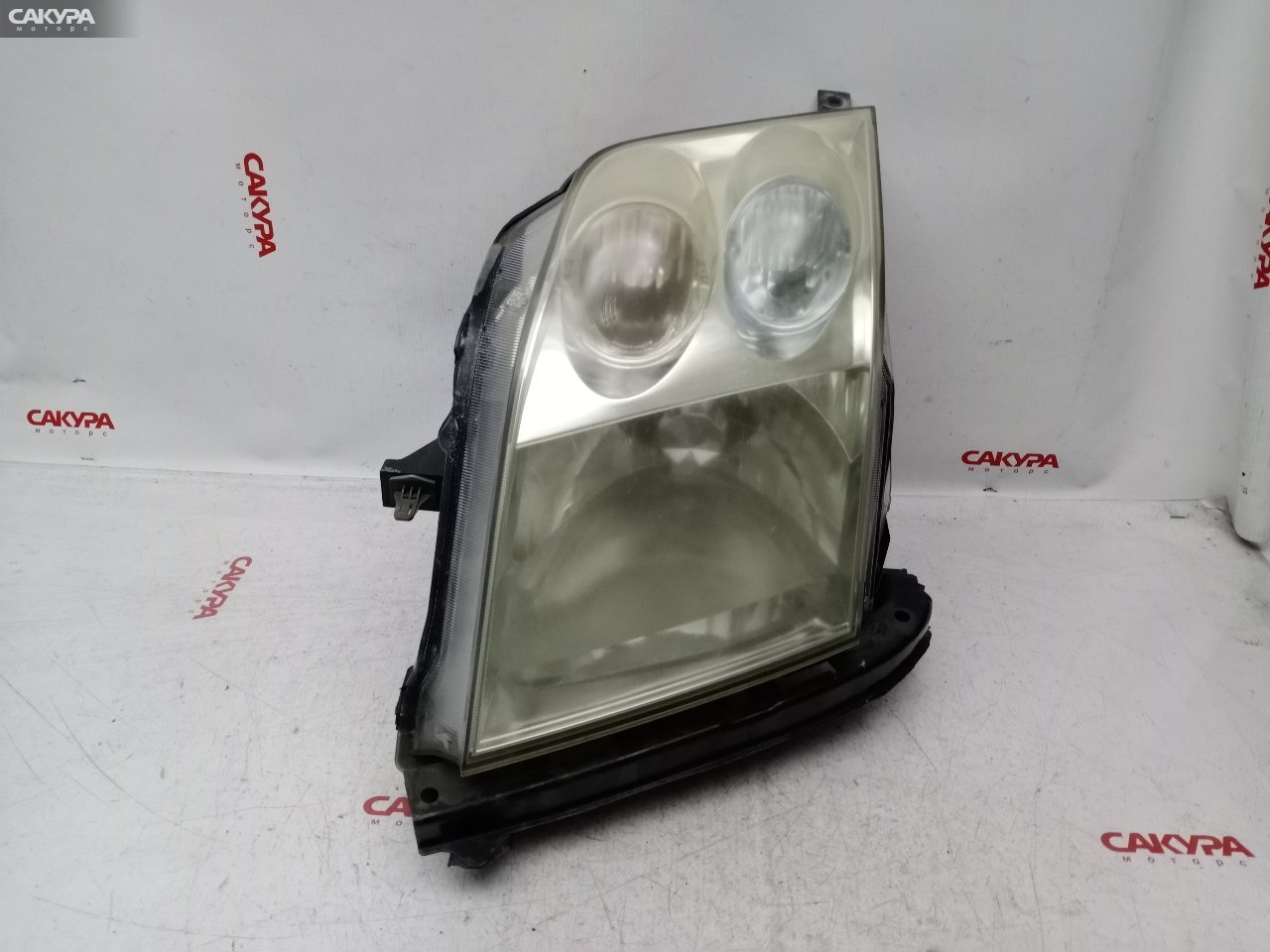 Фара левая Honda Mobilio GB1 L15A 100-22532: купить в Сакура Красноярск.