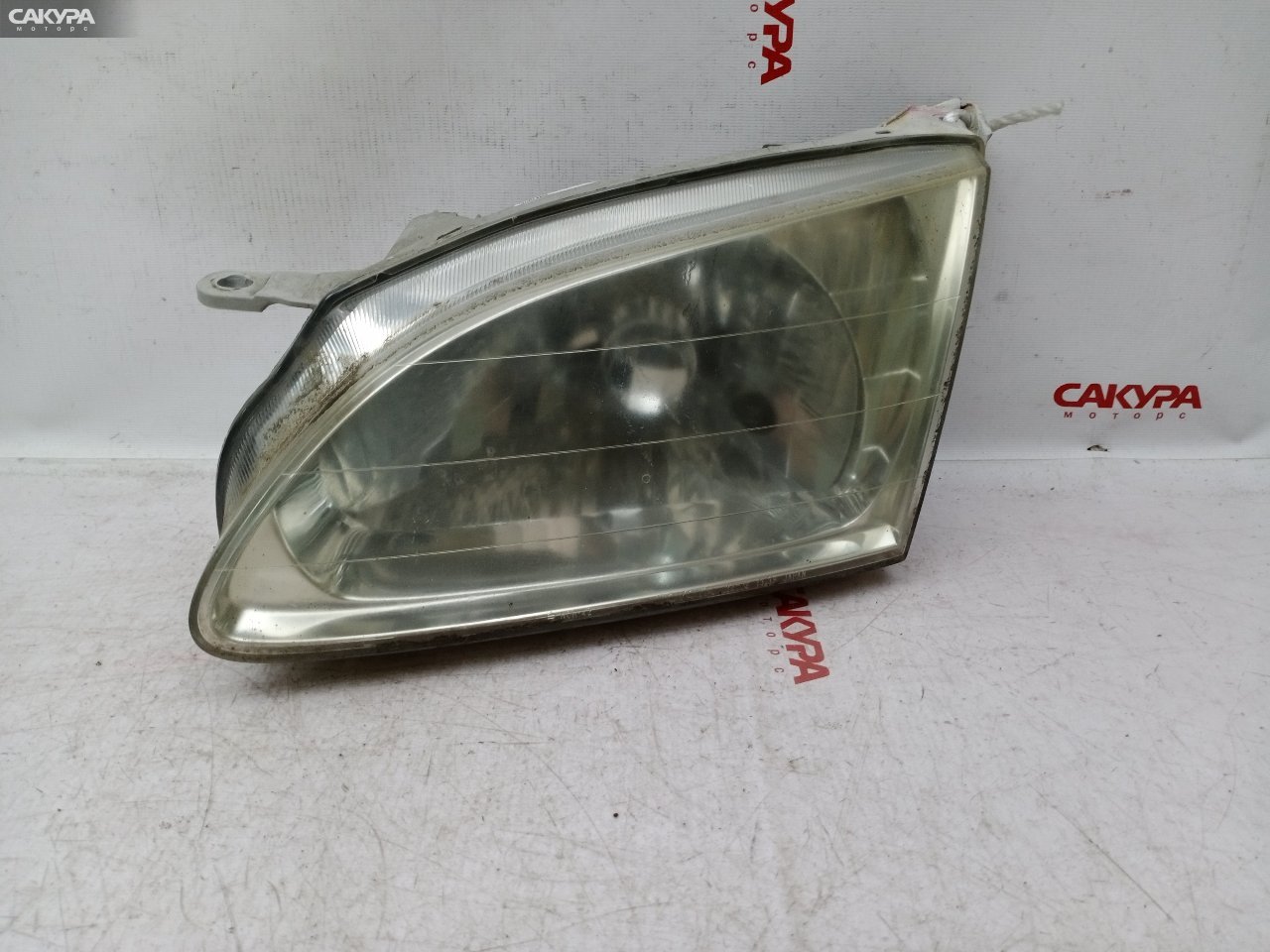 Фара левая Toyota Corolla Spacio AE111N 4A-FE 13-38: купить в Сакура Красноярск.