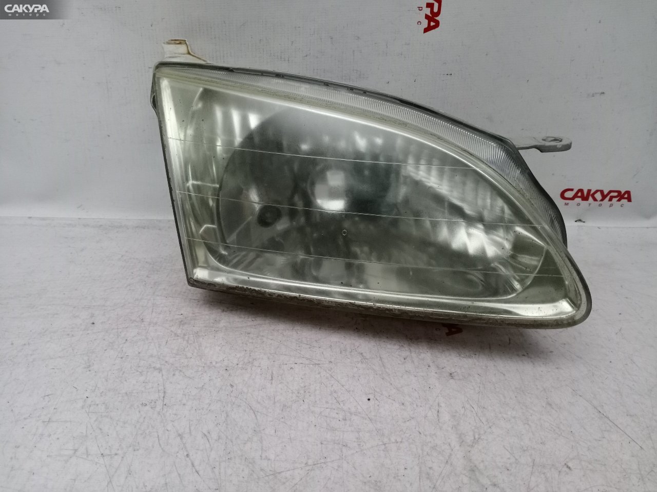 Фара правая Toyota Corolla Spacio AE111N 4A-FE 13-38: купить в Сакура Красноярск.