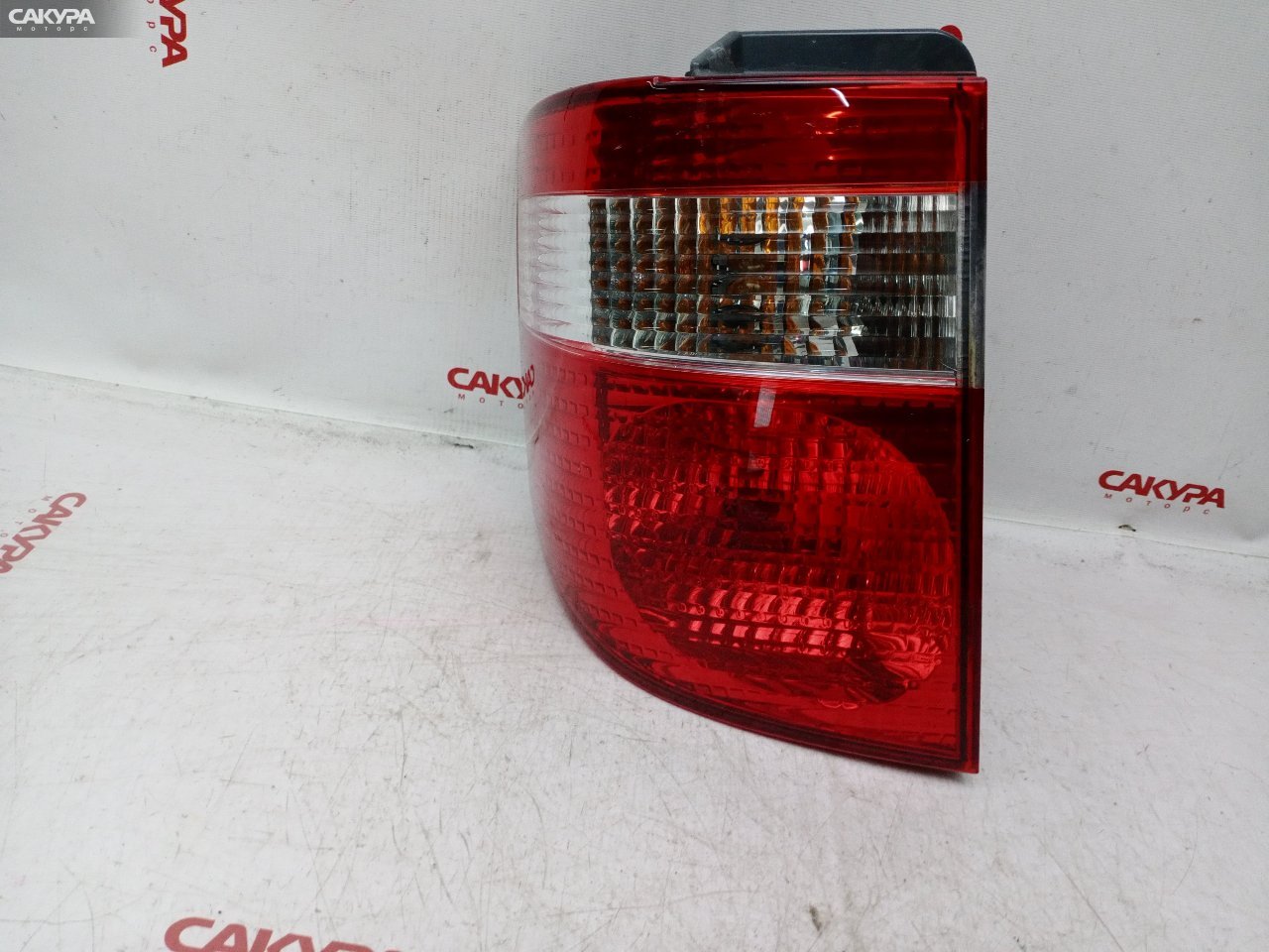 Фонарь стоп-сигнала левый Toyota Alphard MNH10W 1MZ-FE 58-4: купить в Сакура Красноярск.