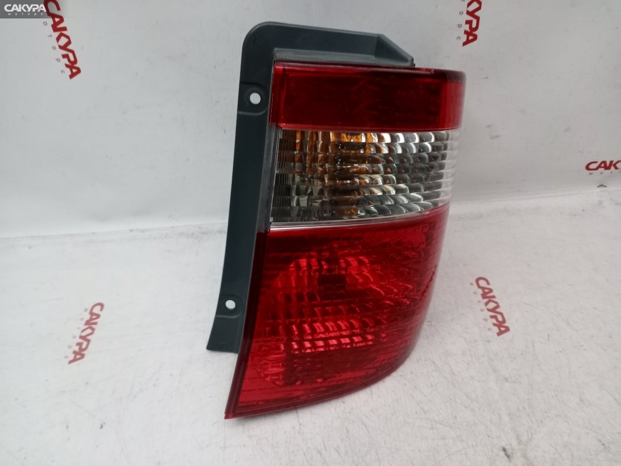 Фонарь стоп-сигнала правый Toyota Alphard MNH10W 1MZ-FE 58-4: купить в Сакура Красноярск.