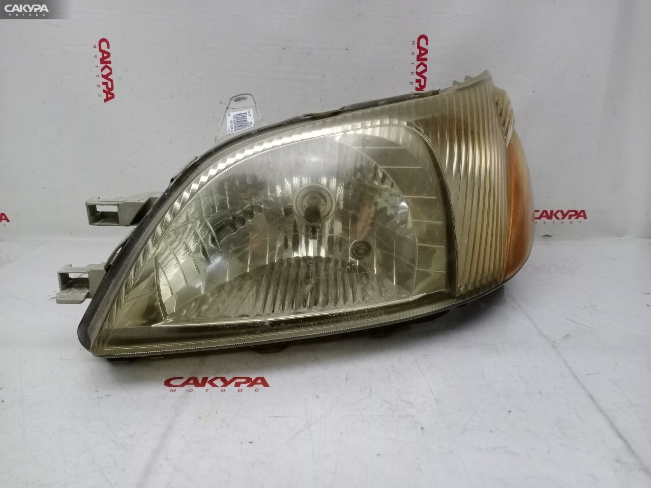 Фара левая Toyota Platz NCP12 1NZ-FE 52-009: купить в Сакура Красноярск.