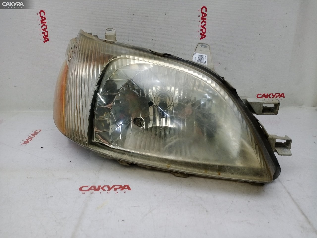 Фара правая Toyota Platz NCP12 1NZ-FE 52-009: купить в Сакура Красноярск.