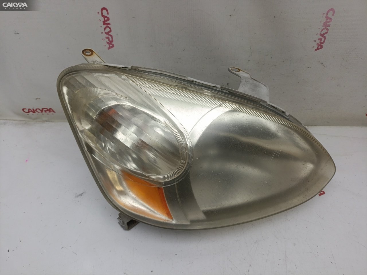 Фара правая Toyota Platz NCP16 2NZ-FE 52-067: купить в Сакура Красноярск.