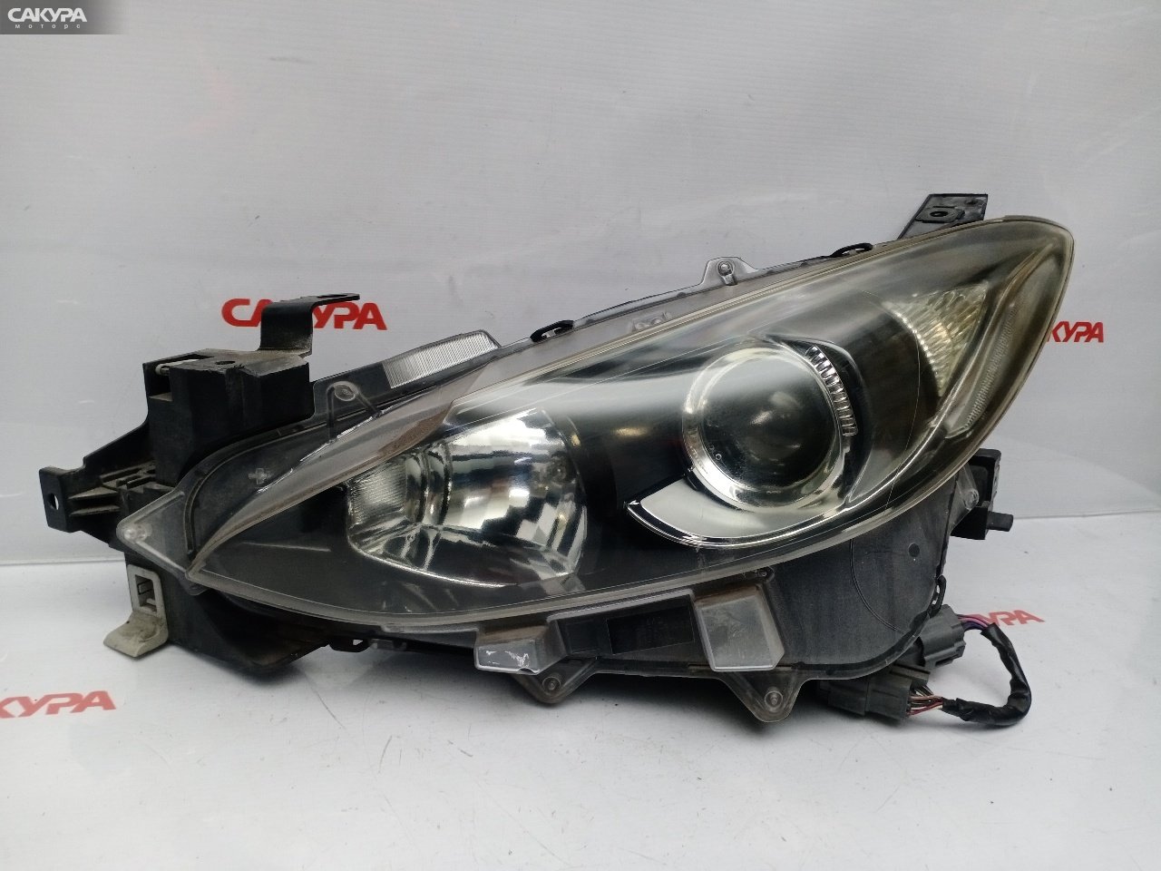 Фара левая Mazda Axela BM6FJ Z6-VE W1334: купить в Сакура Красноярск.