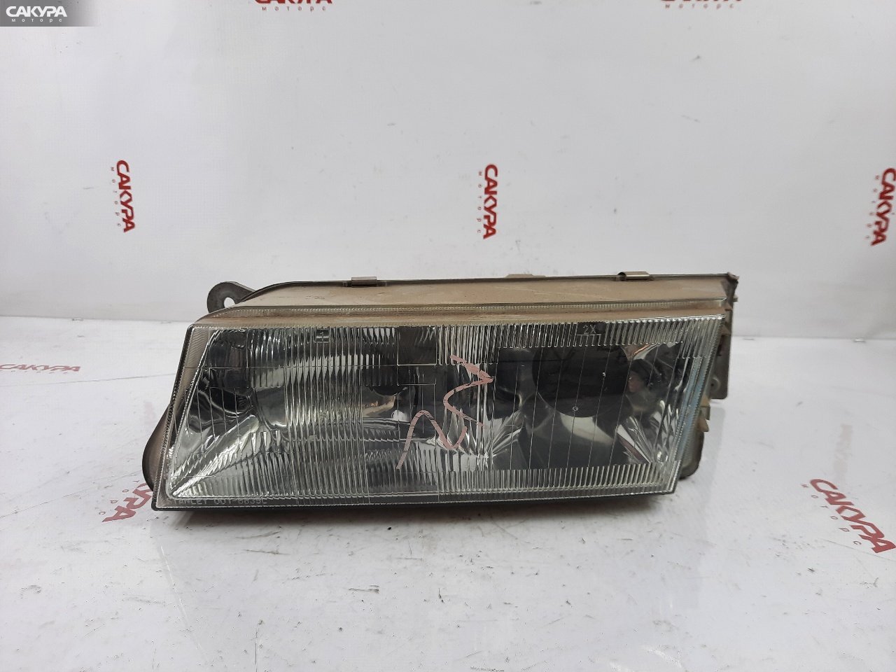 Фара левая Mazda Capella CG2PP 001-6835: купить в Сакура Красноярск.