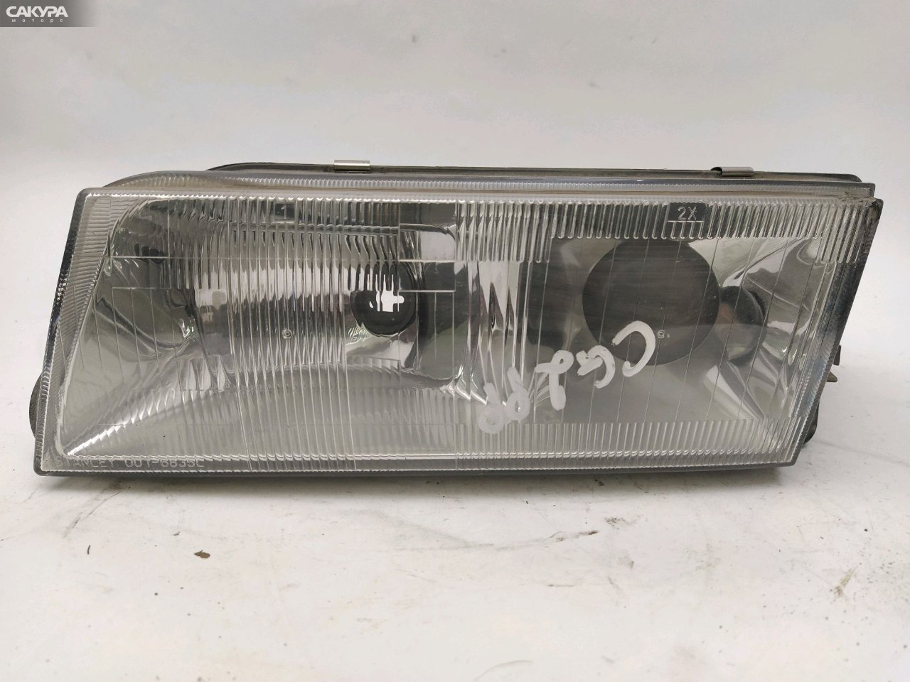 Фара левая Mazda Capella CG2PP 001-6835: купить в Сакура Красноярск.