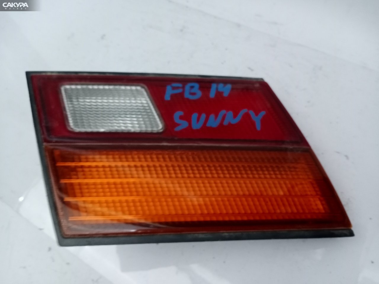 Фонарь вставка багажника левый Nissan Sunny B14 4774: купить в Сакура Красноярск.