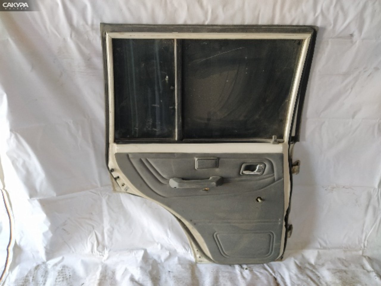 Дверь боковая задняя левая Mitsubishi Pajero V46V 4M40-T: купить в Сакура Красноярск.