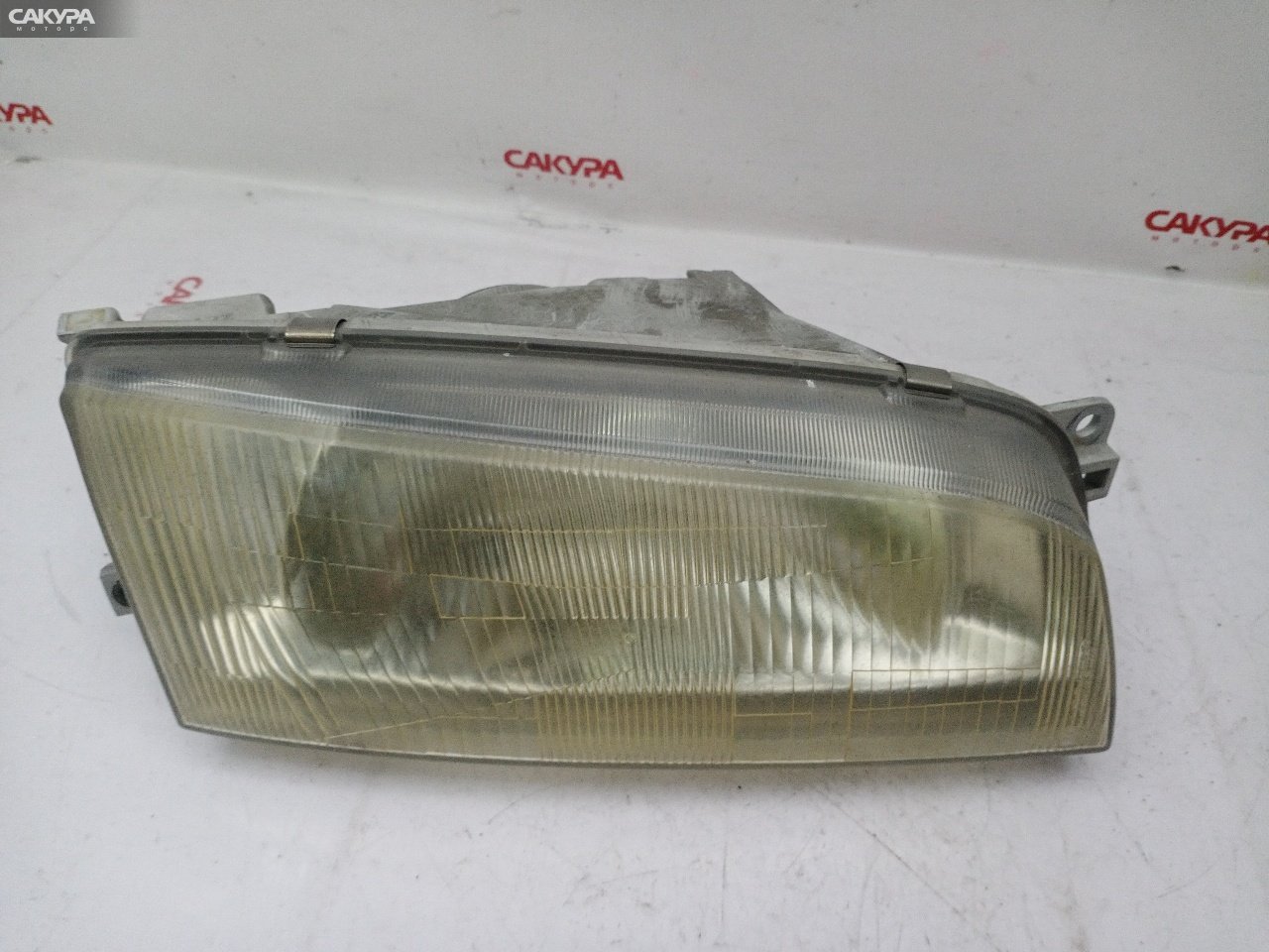 Фара правая Mitsubishi Lancer CK2A 4G15 001-7507: купить в Сакура Красноярск.