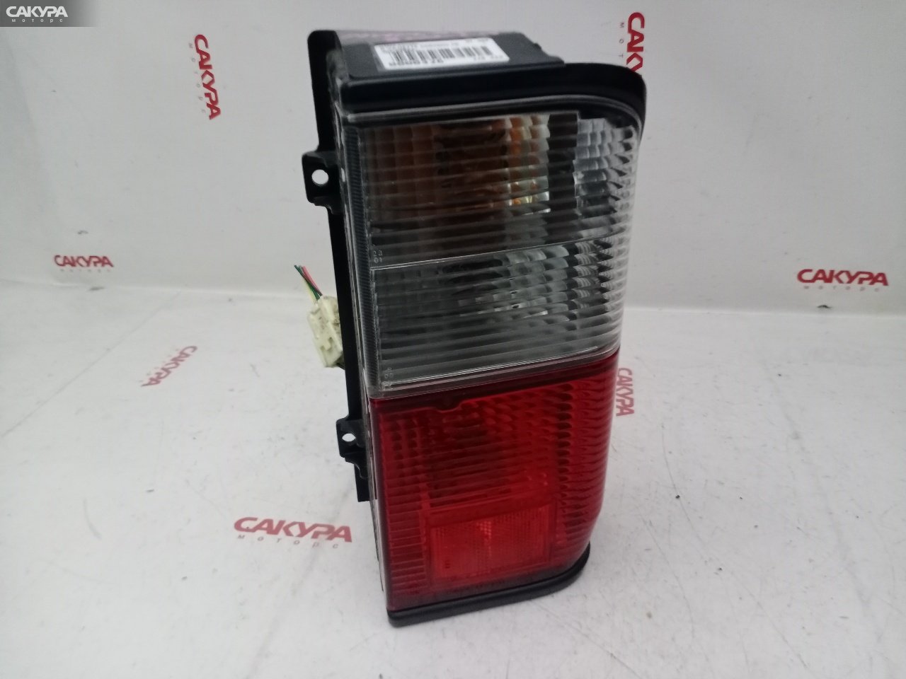 Фонарь стоп-сигнала правый Nissan Vanette SK82MN F8 220-61871: купить в Сакура Красноярск.