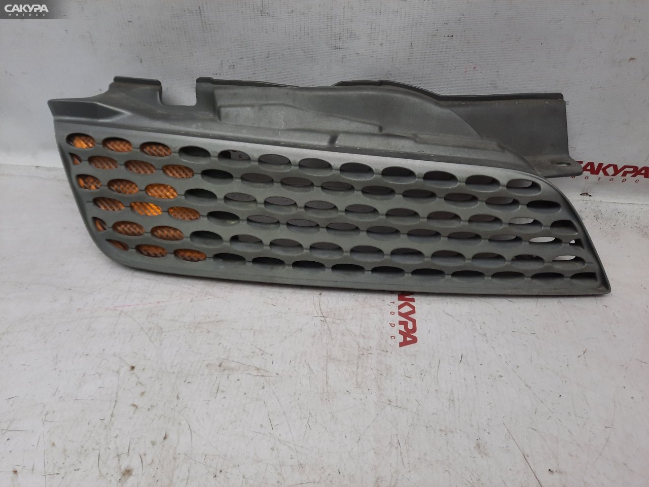 Решетка радиатора правая Nissan March AK12 CR12DE: купить в Сакура Красноярск.