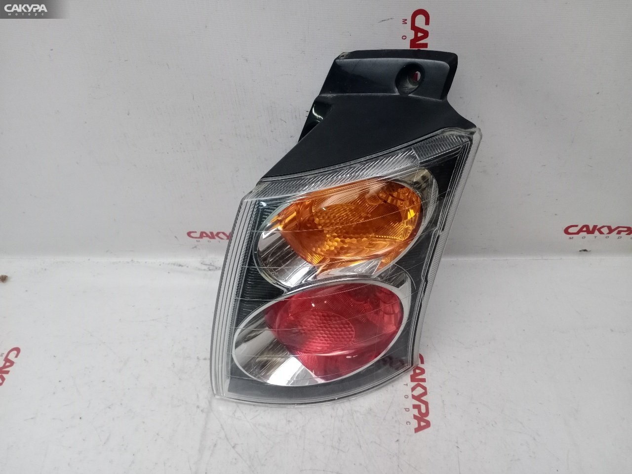 Фонарь стоп-сигнала правый Mitsubishi Colt Plus Z23W 4A91 P4600: купить в Сакура Красноярск.