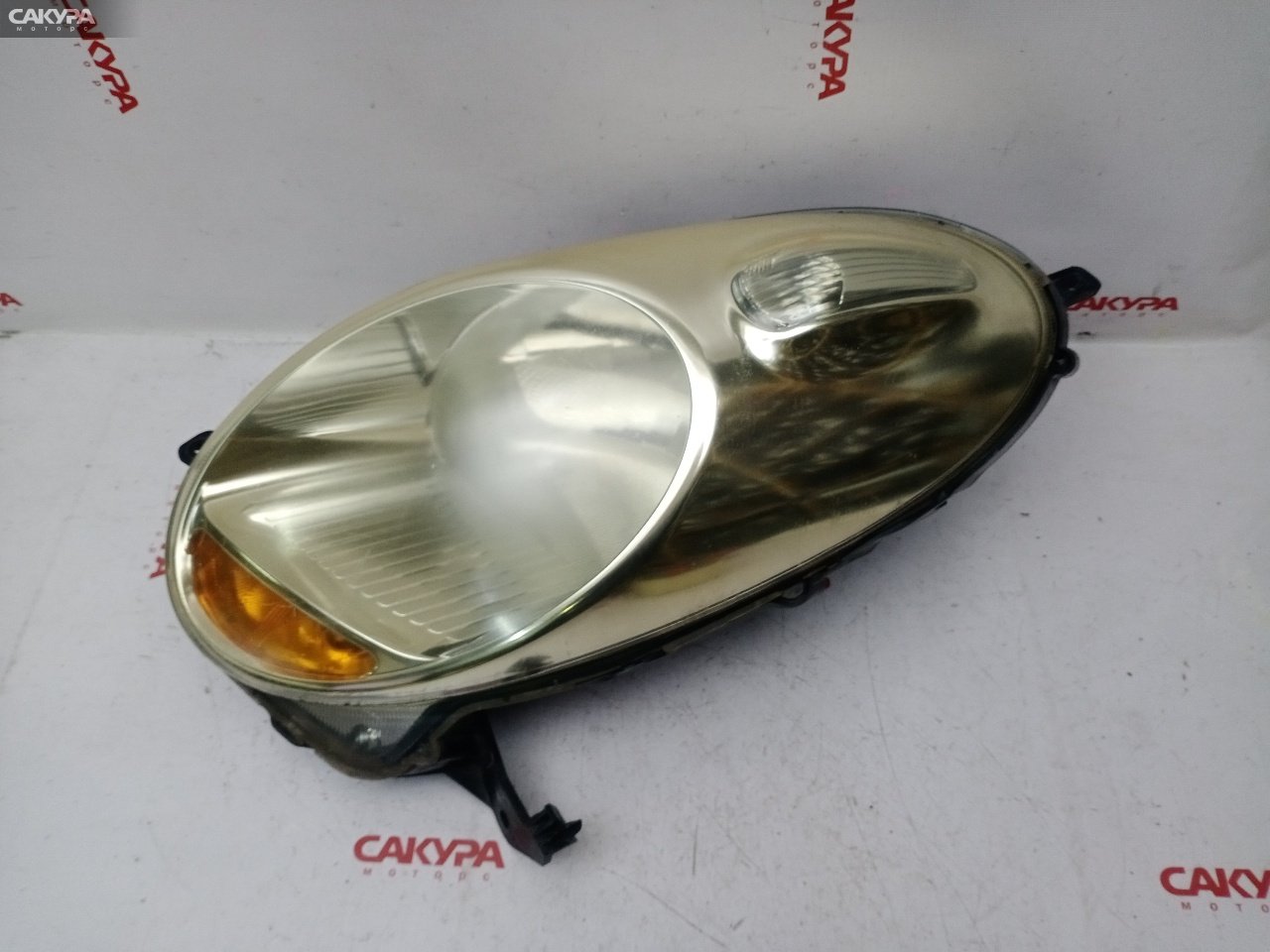 Фара левая Nissan March AK12 CR12DE 1816: купить в Сакура Красноярск.