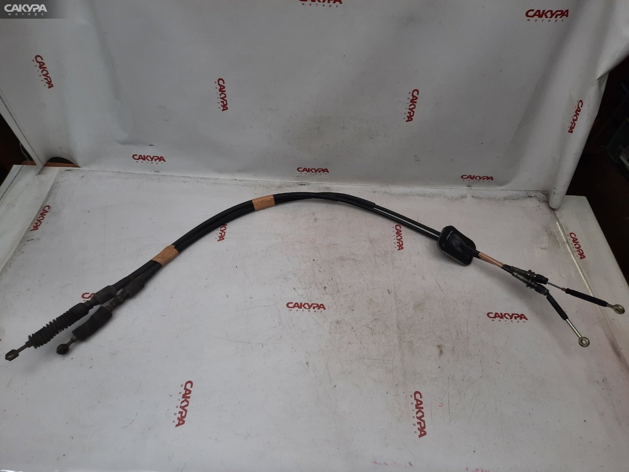 Трос КПП Mitsubishi Delica PC4W 4G64: купить в Сакура Красноярск.