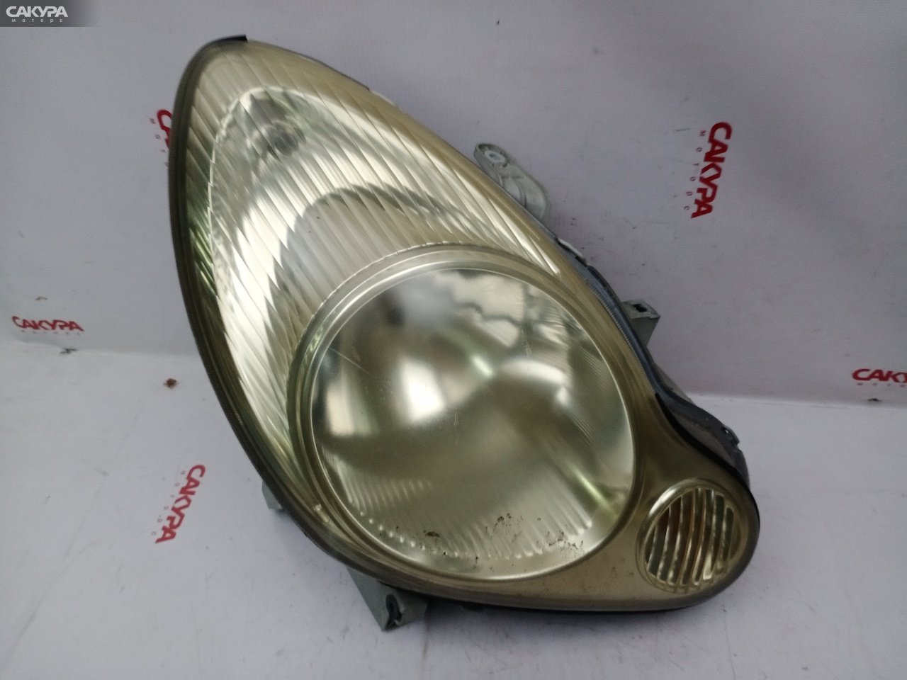 Фара правая Toyota Duet M100A EJ-VE P2359: купить в Сакура Красноярск.