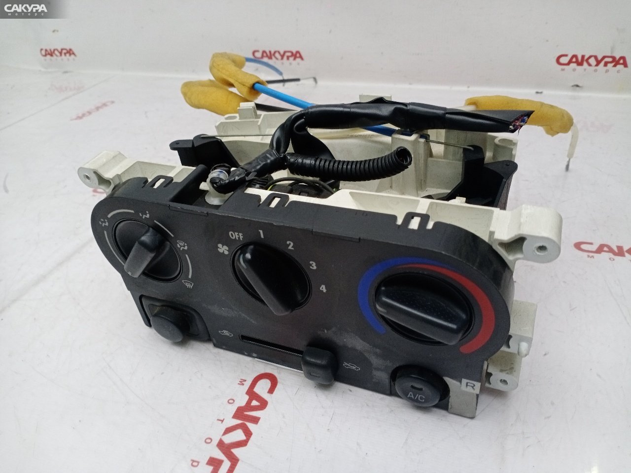 Блок управления климат-контролем Toyota Duet M101A K3-VE: купить в Сакура Красноярск.