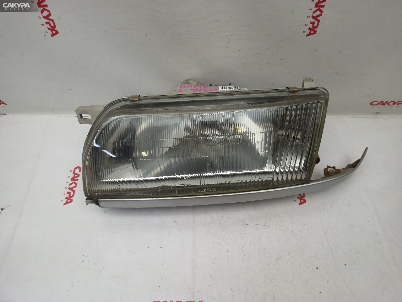 Фара левая Nissan Primera HNP10 SR20DE 100-63317: купить в Сакура Красноярск.