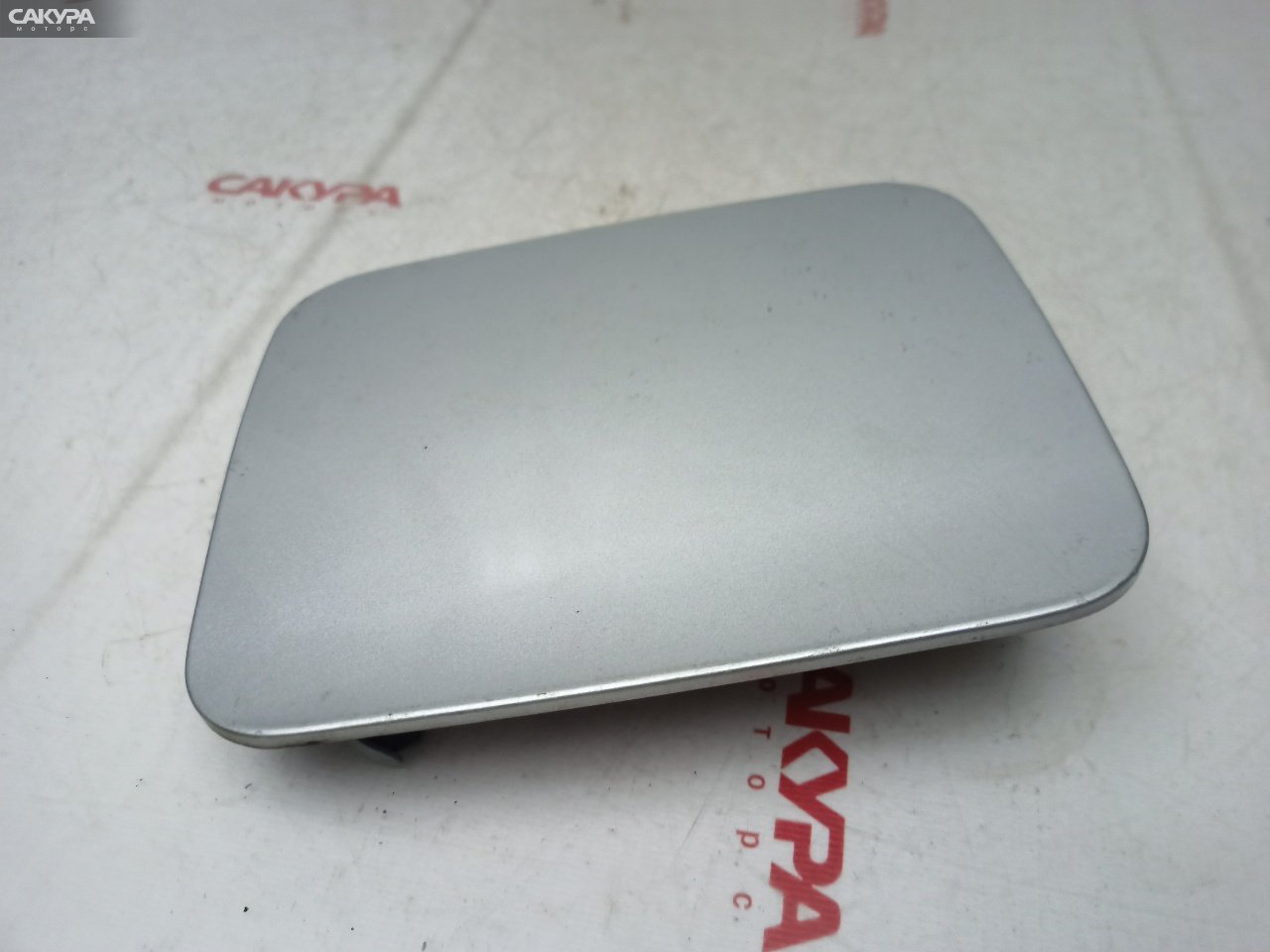 Лючок топливного бака Toyota Platz NCP12 1NZ-FE: купить в Сакура Красноярск.