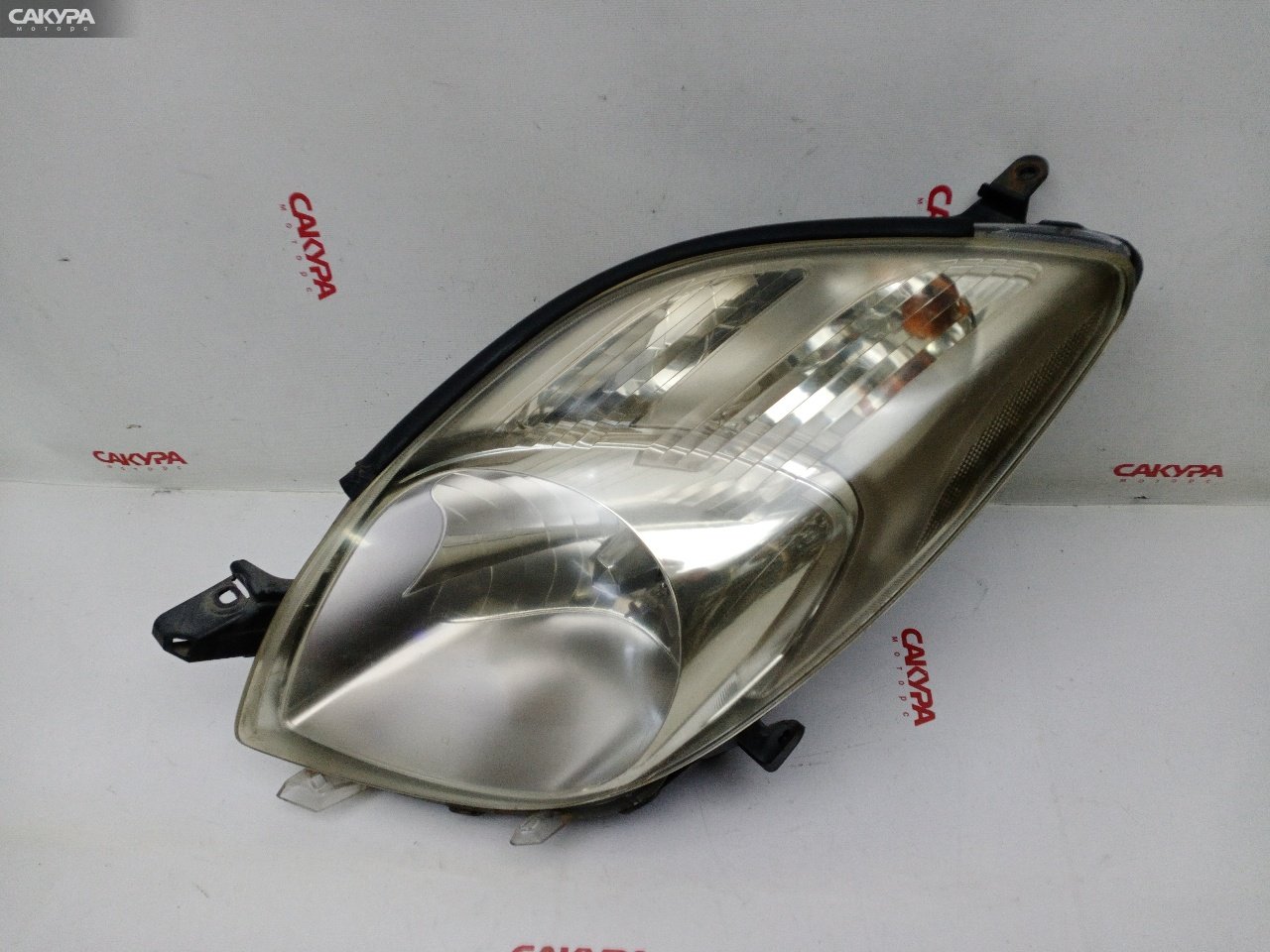 Фара левая Toyota Vitz KSP90 1KR-FE 52-170: купить в Сакура Красноярск.