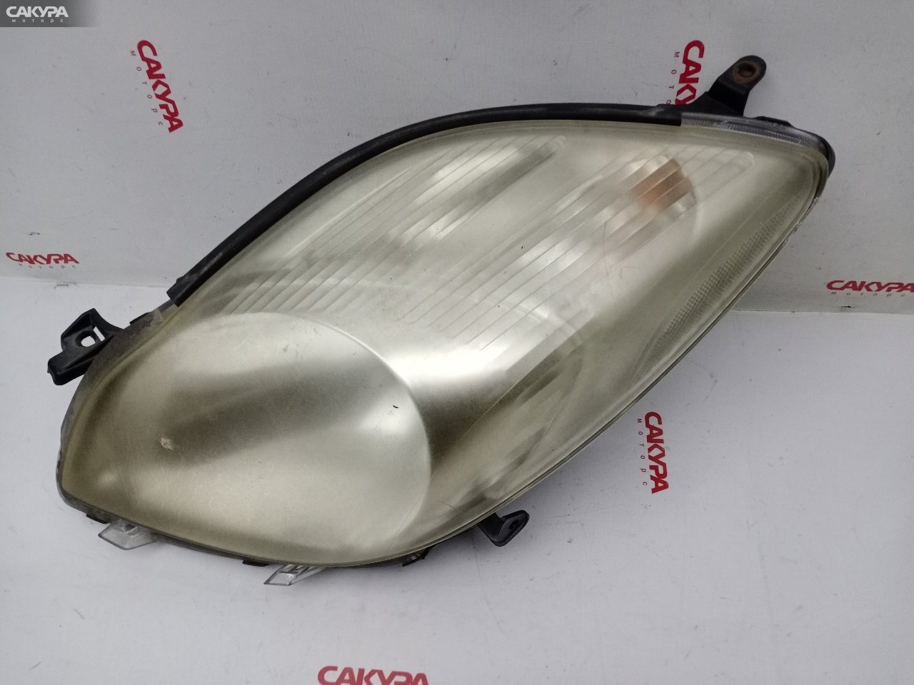 Фара левая Toyota Vitz KSP90 1KR-FE 52-184: купить в Сакура Красноярск.