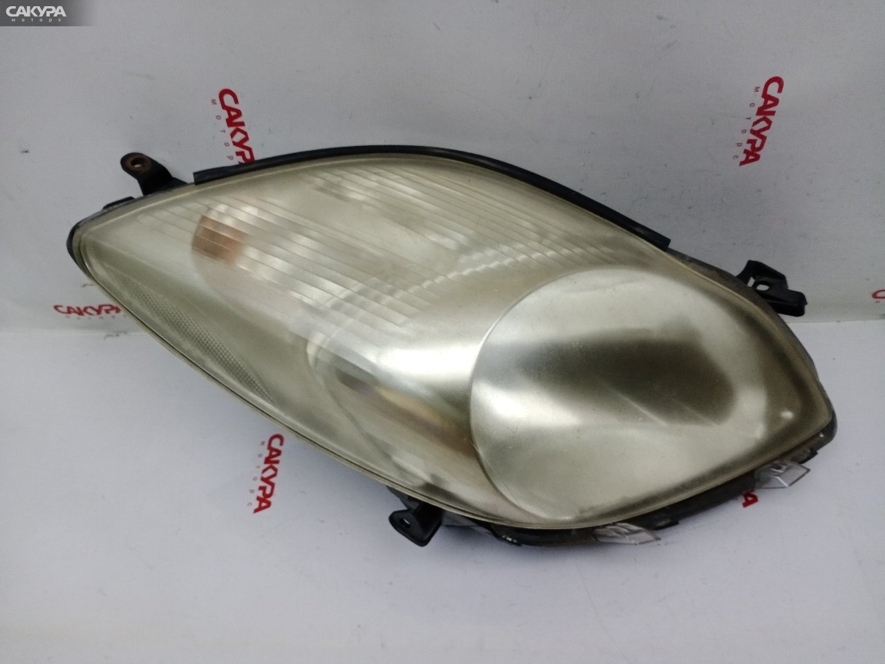 Фара правая Toyota Vitz KSP90 1KR-FE 52-184: купить в Сакура Красноярск.