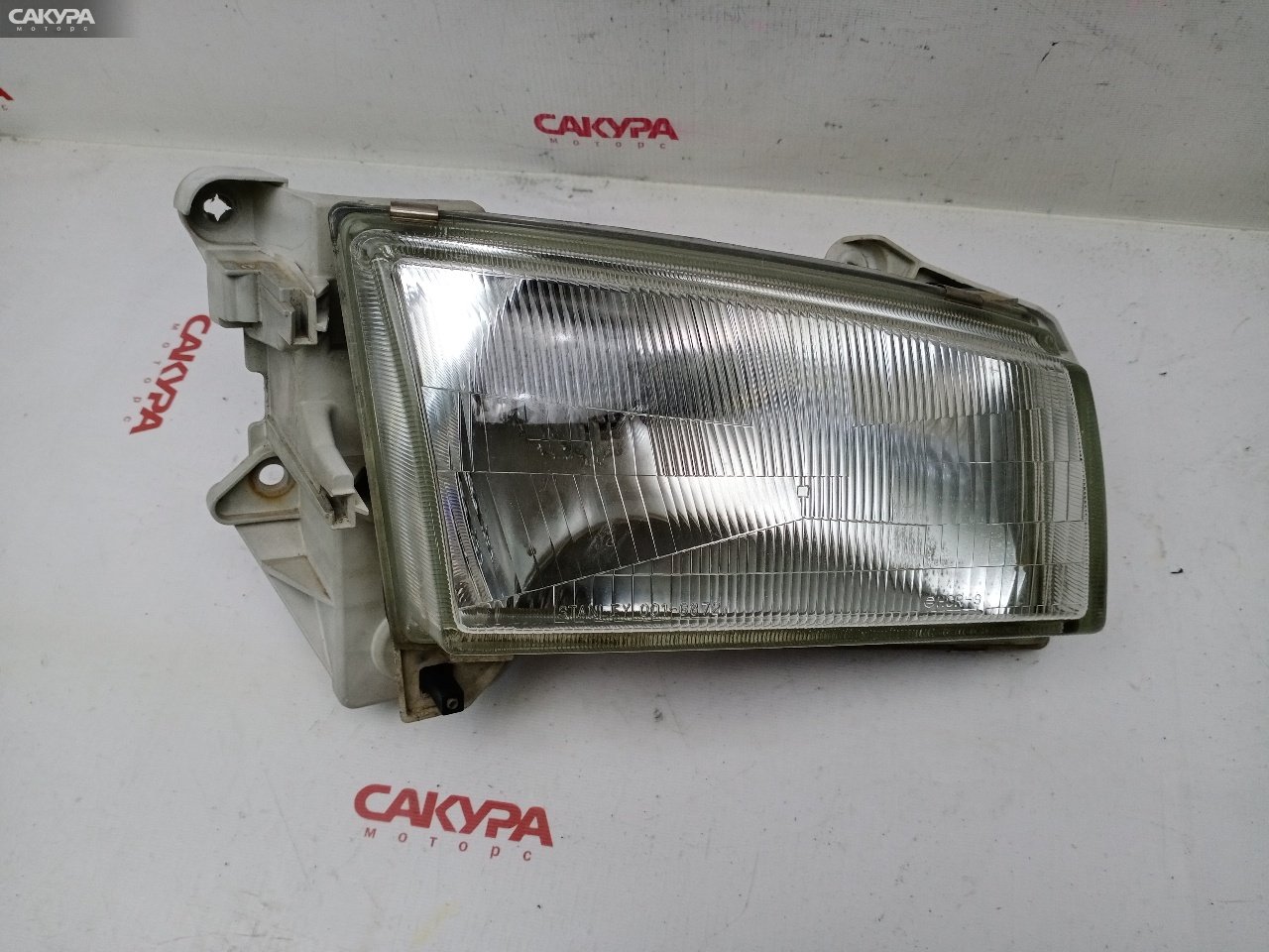Фара правая Mazda Demio DW3W B3-ME 001-6872: купить в Сакура Красноярск.