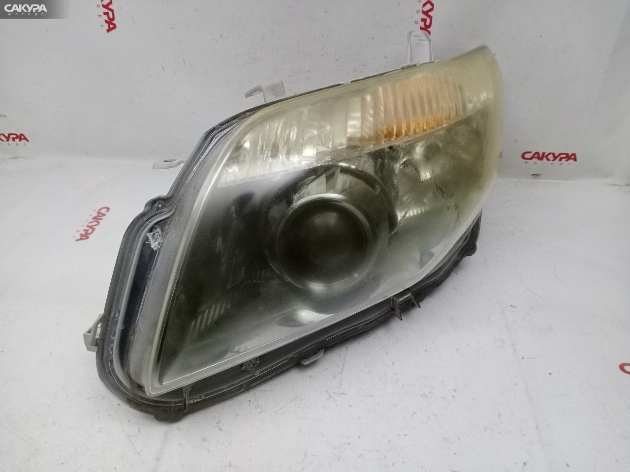 Фара левая Toyota Corolla Fielder NZE141G 1NZ-FE 12-526: купить в Сакура Красноярск.