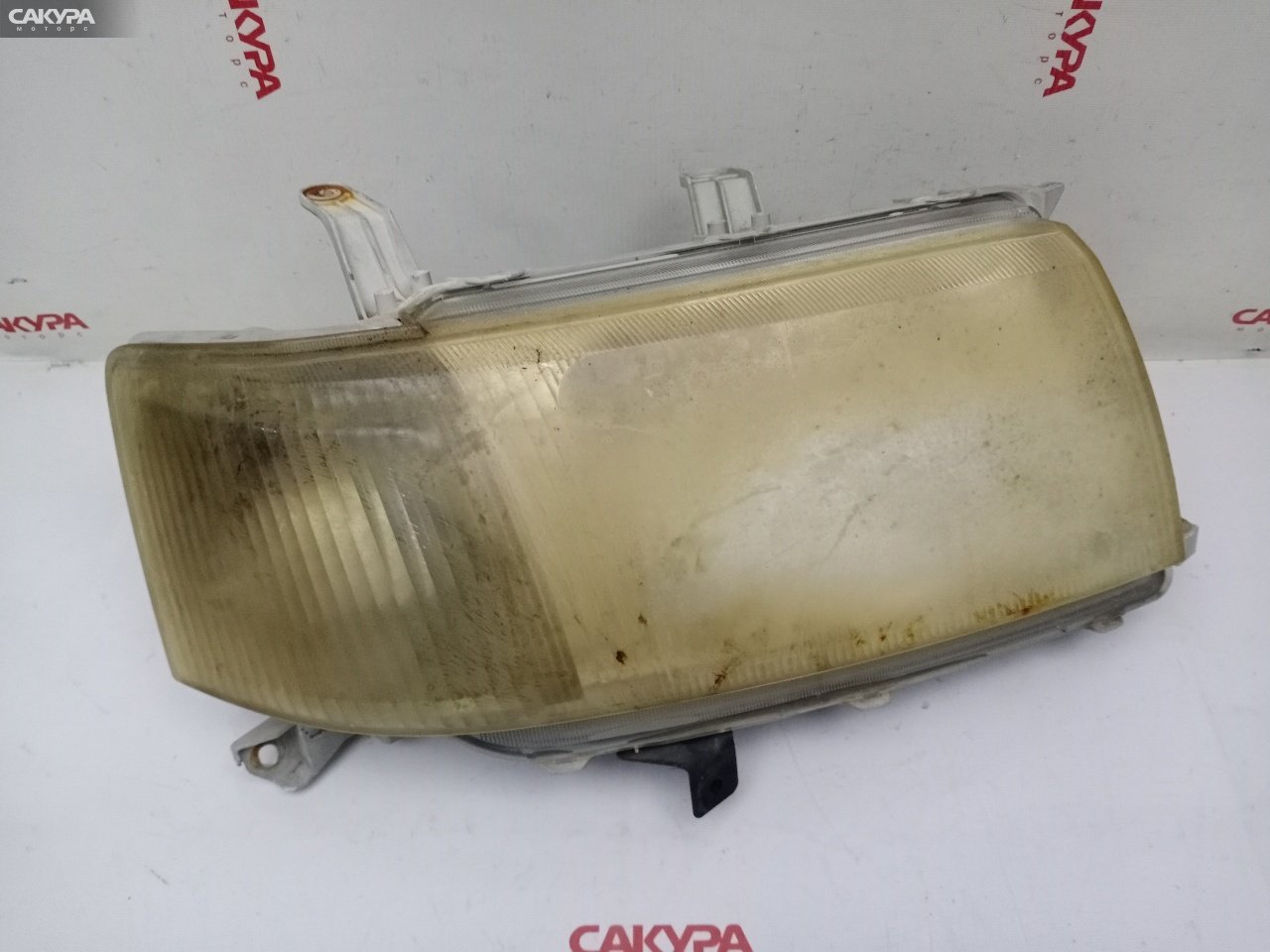 Фара правая Toyota Probox NCP50V 2NZ-FE 52-075: купить в Сакура Красноярск.