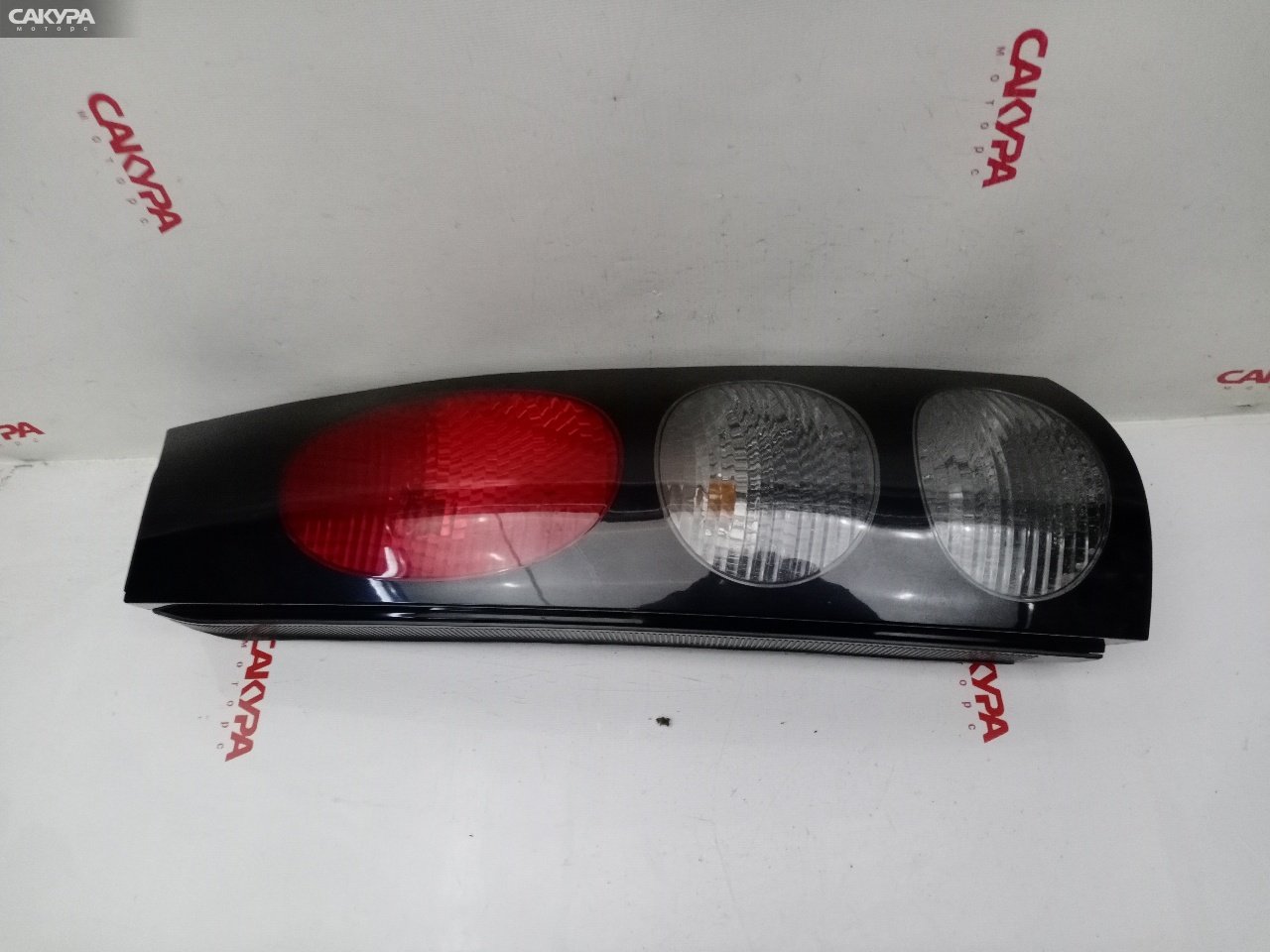Фонарь стоп-сигнала правый Toyota Raum EXZ15 5E-FE 46-3: купить в Сакура Красноярск.