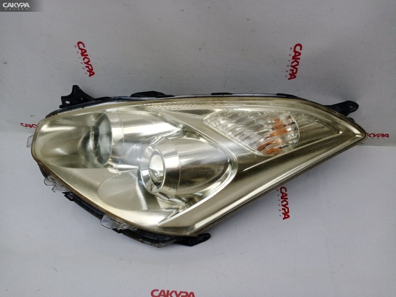 Фара левая Toyota Wish ZNE10G 1ZZ-FE 68-12: купить в Сакура Красноярск.