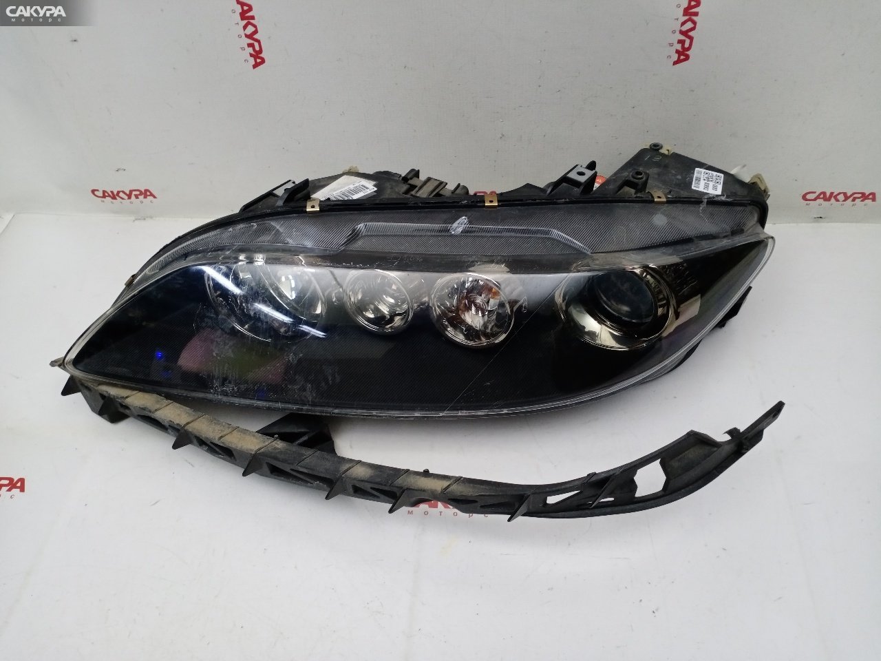 Фара левая Mazda Atenza GY3W L3-VE 1344: купить в Сакура Красноярск.