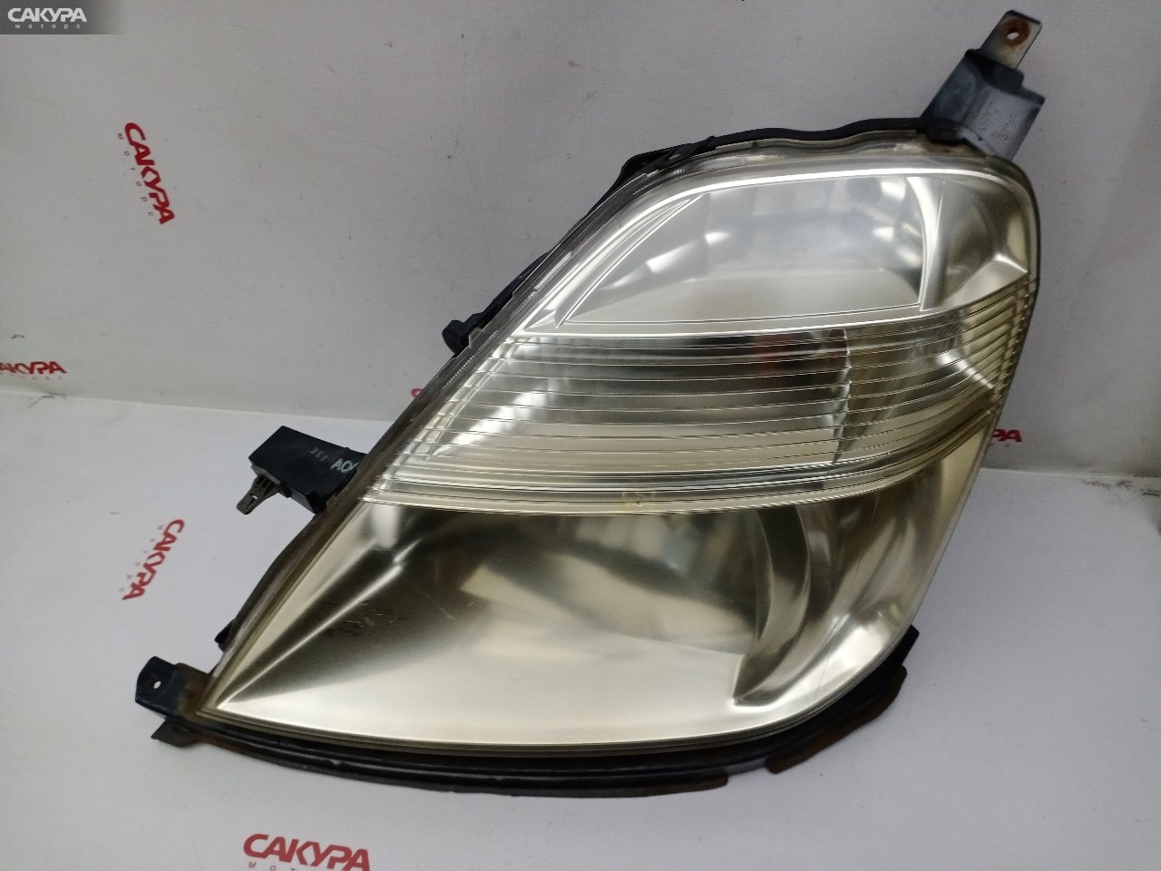 Фара левая Honda Stream RN1 D17A 100-22360: купить в Сакура Красноярск.