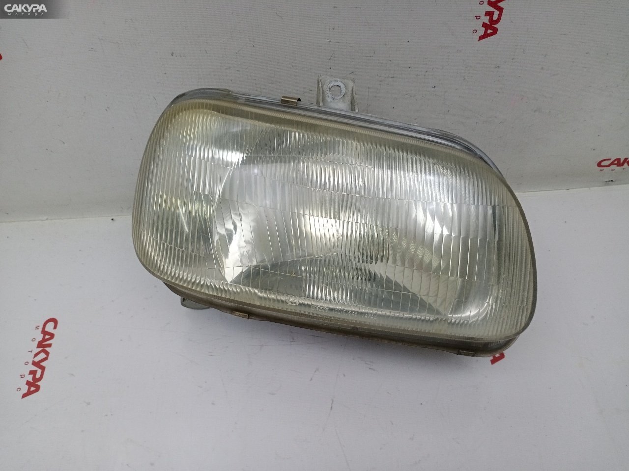 Фара правая Daihatsu Mira L500V EF-CL 100-51545: купить в Сакура Красноярск.