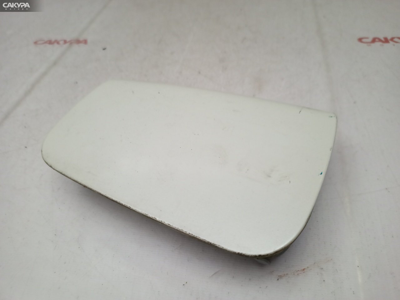Лючок топливного бака Nissan March AK12 CR12DE: купить в Сакура Красноярск.