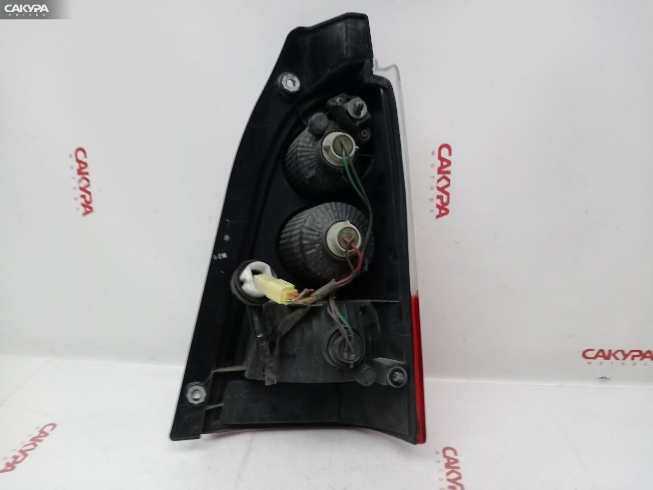Фонарь стоп-сигнала левый Suzuki Wagon R Solio ME34S M13A 220-59030: купить в Сакура Красноярск.