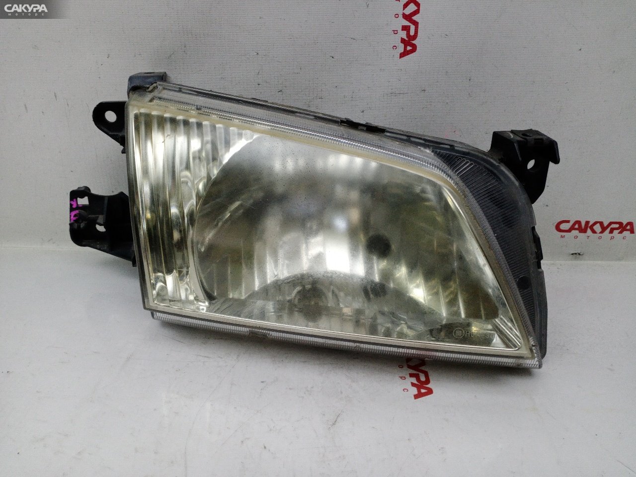 Фара правая Mazda Demio DW3W B3E P1001: купить в Сакура Красноярск.