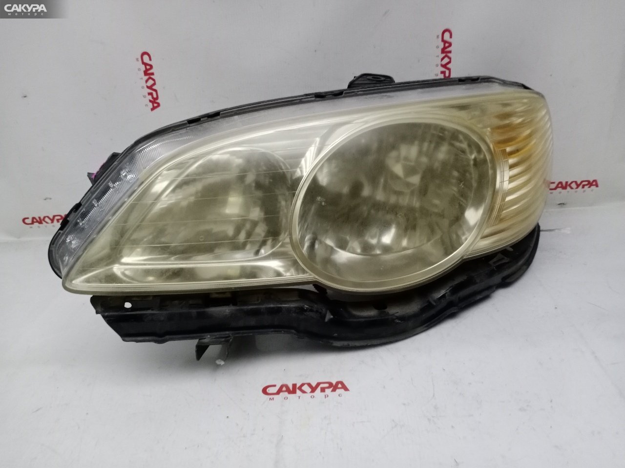 Фара левая Honda Odyssey RA6 F23A p0648: купить в Сакура Красноярск.