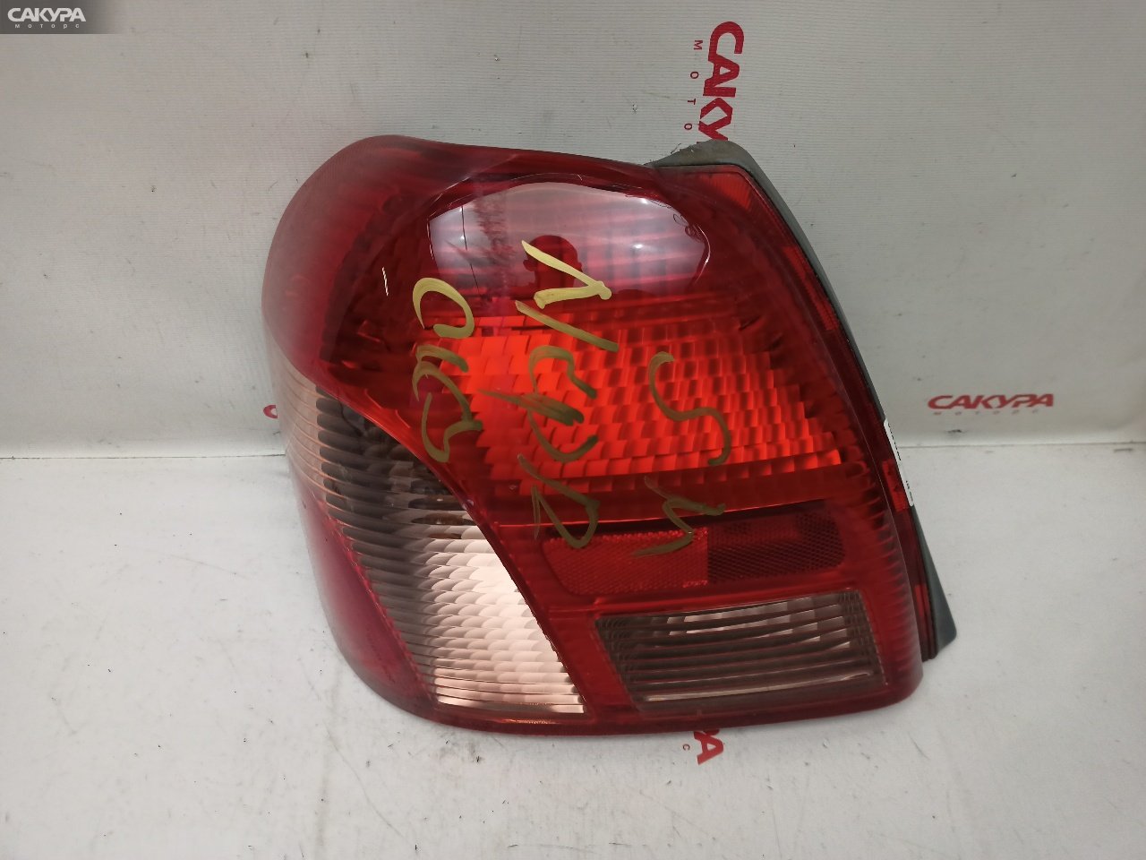 Фонарь стоп-сигнала левый Toyota Platz NCP12 1NZ-FE 52-013: купить в Сакура Красноярск.