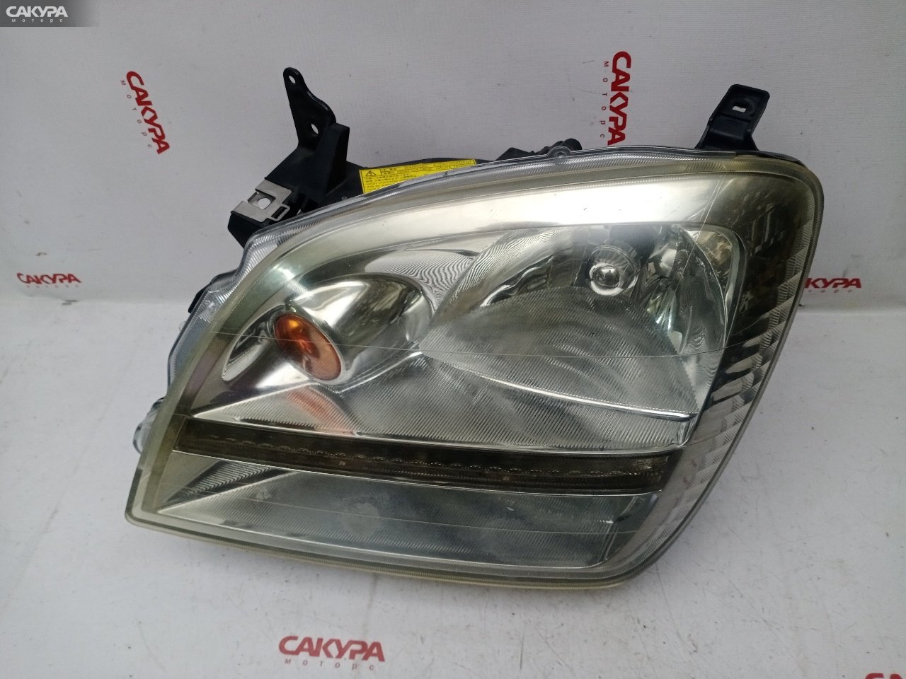 Фара левая Mitsubishi Dion CR6W 4G94 100-87595: купить в Сакура Красноярск.