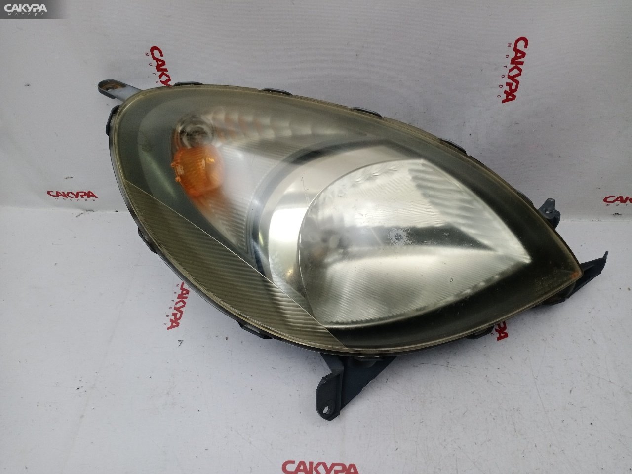 Фара правая Toyota Funcargo NCP20 2NZ-FE 52-024: купить в Сакура Красноярск.