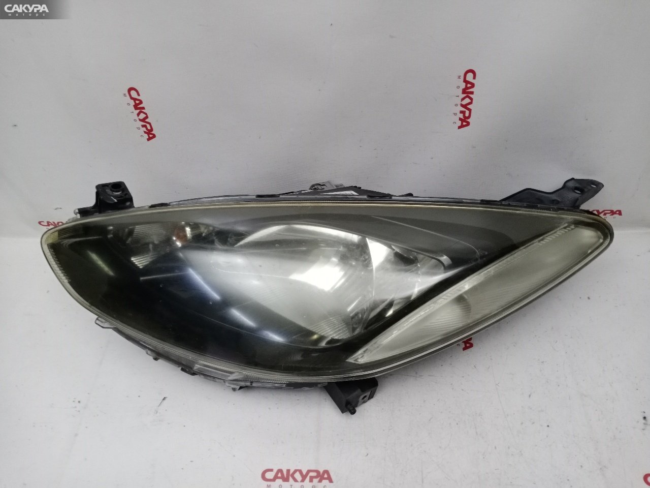 Фара левая Mazda Demio DE3FS ZJ-VE P6514: купить в Сакура Красноярск.