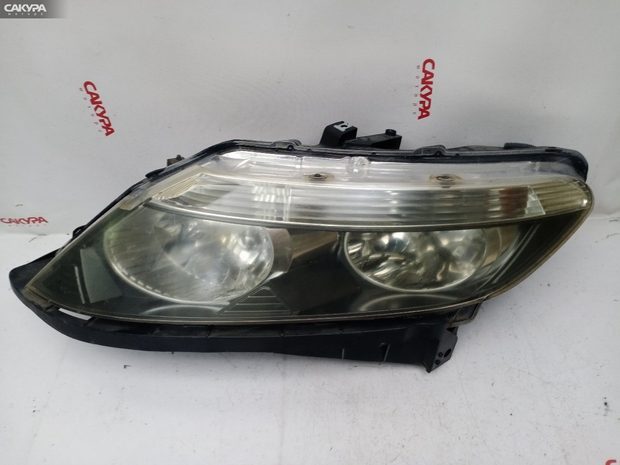 Фара левая Honda Airwave GJ1 L15A 100-22592: купить в Сакура Красноярск.