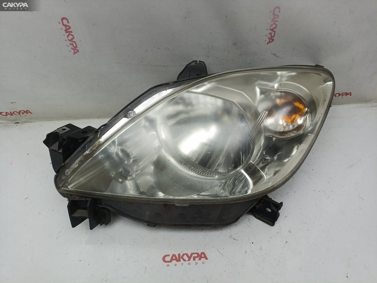 Фара левая Mazda Demio DY3W ZJ-VE P5548: купить в Сакура Красноярск.