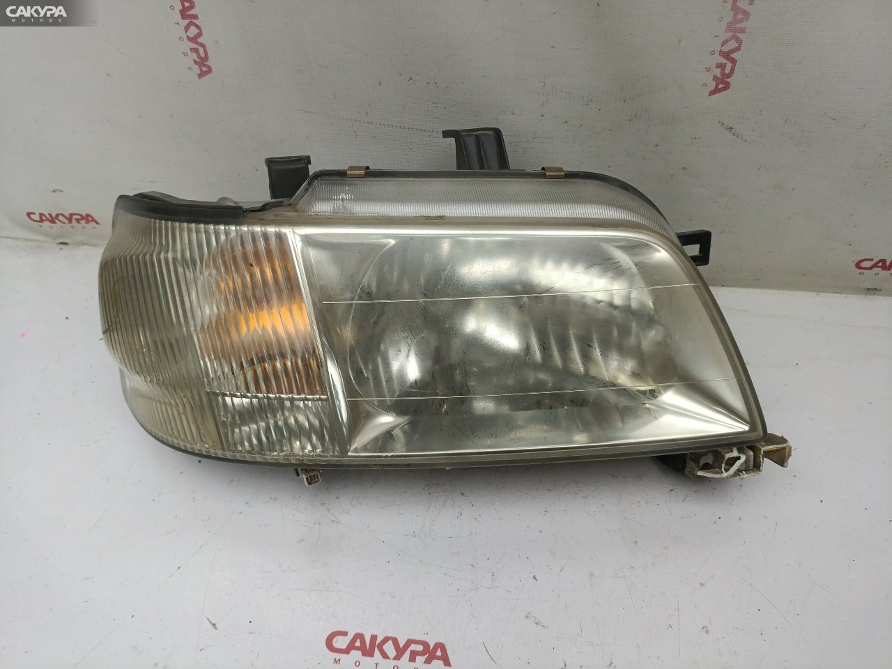 Фара правая Nissan Cube AZ10 CGA3DE 100-66258: купить в Сакура Красноярск.
