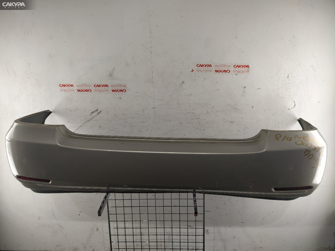Бампер задний Toyota Corolla NZE120 2NZ-FE: купить в Сакура Красноярск.