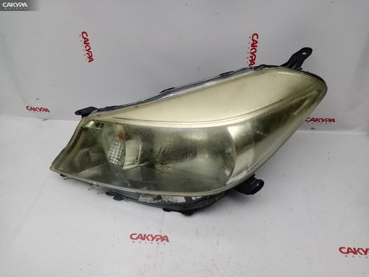 Фара левая Toyota Vitz NSP130 1NR-FE 52-236: купить в Сакура Красноярск.