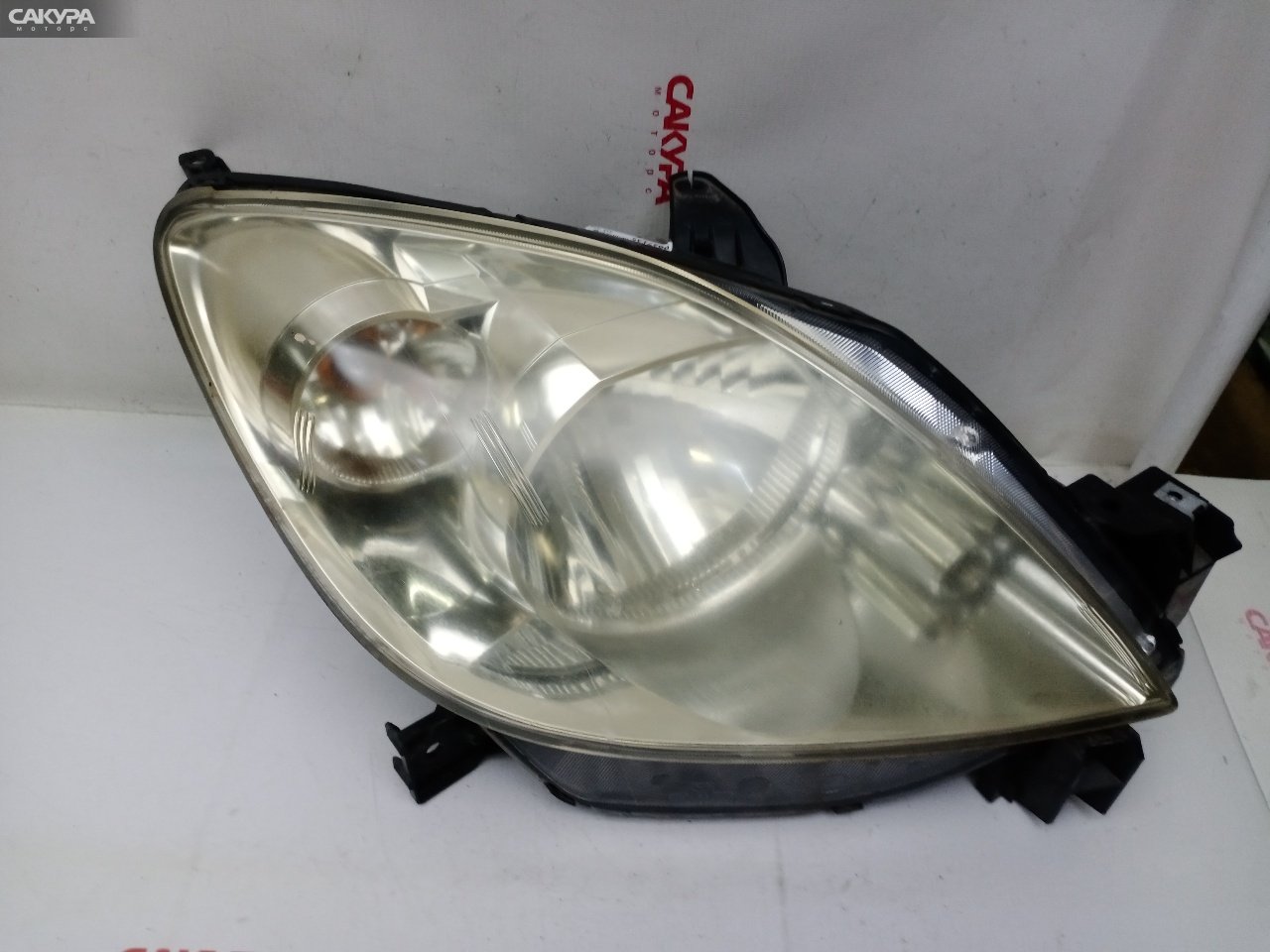Фара правая Mazda Demio DY3W ZJ-VE P5548: купить в Сакура Красноярск.