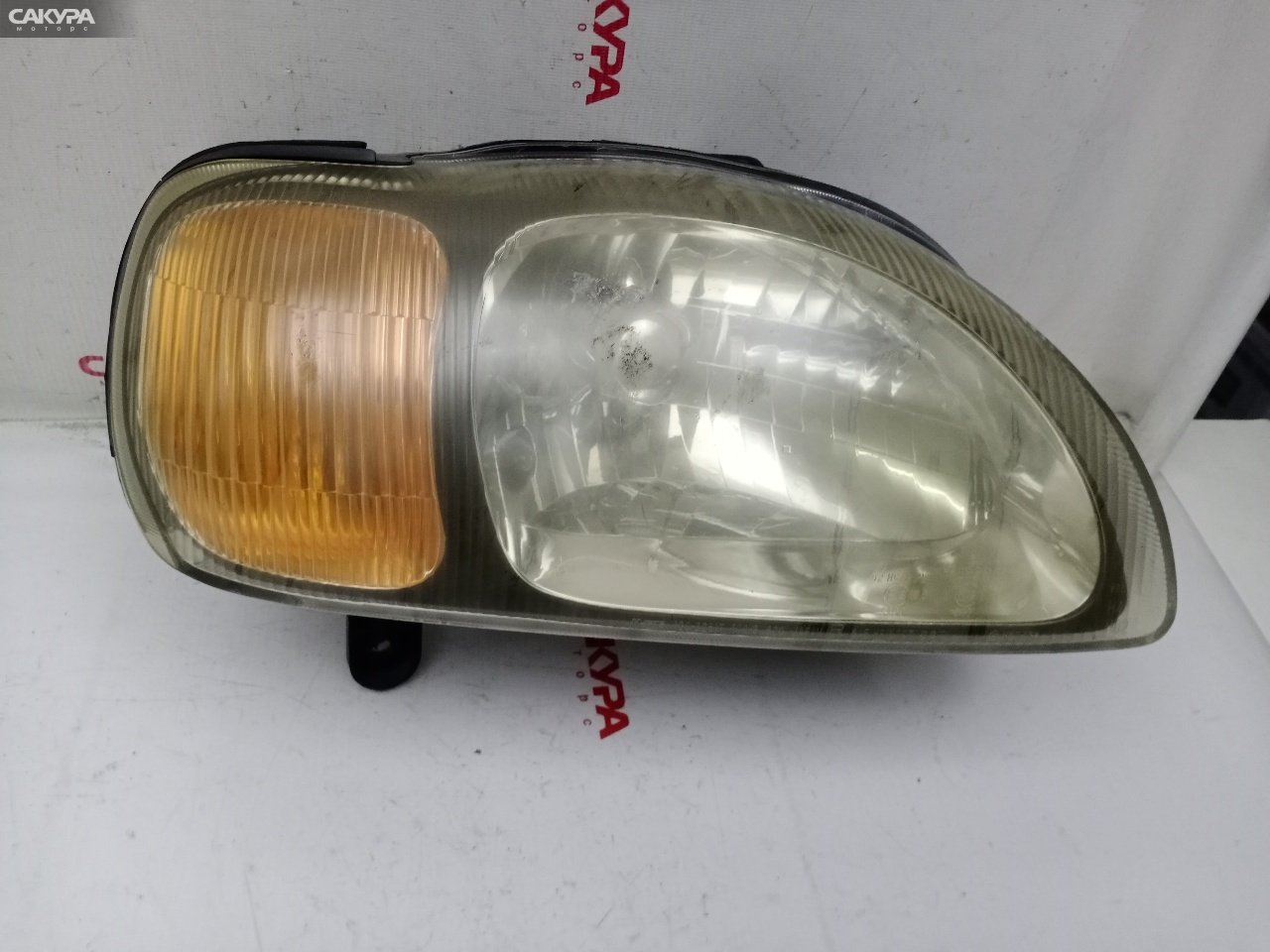 Фара правая Suzuki Cultus GC21W G15A 100-32617: купить в Сакура Красноярск.